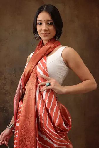 Peach Soft Silk Lahriya Printed Saree With Zari Woven Pallu