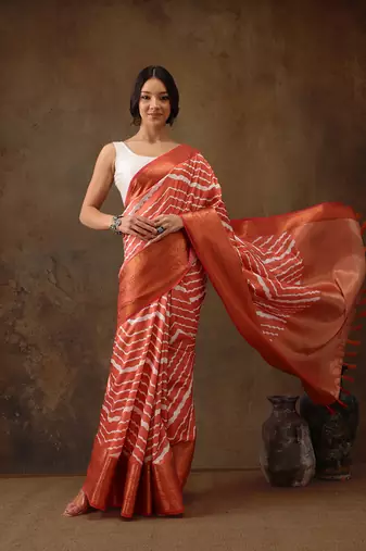 Peach Soft Silk Lahriya Printed Saree With Zari Woven Pallu