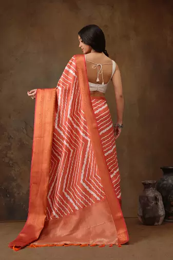 Peach Soft Silk Lahriya Printed Saree With Zari Woven Pallu