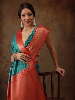 Teal Faux Kanjeevaram Pattu Zari Woven Border Floral Printed Saree 2