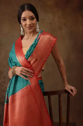 Teal Faux Kanjeevaram Pattu Zari Woven Border Floral Printed Saree