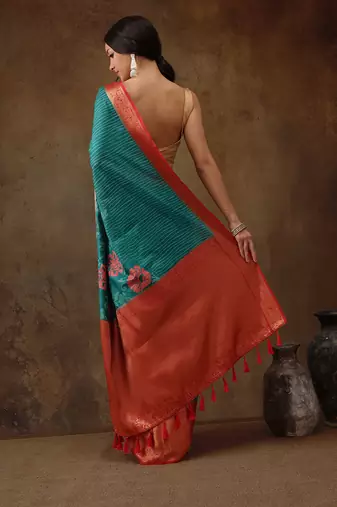 Teal Faux Kanjeevaram Pattu Zari Woven Border Floral Printed Saree
