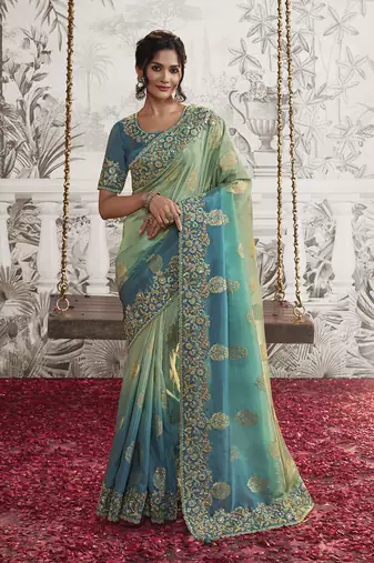 Blue colour viscose silk embroidered saree by monjolika fashion