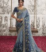 Navy blue colour viscose silk blend embroidered saree by monjolika fashion