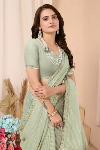 Pista Green Embellished Georgette Saree With Blouse Piece
