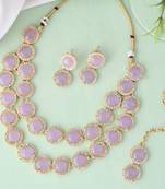 Sasha  pink multi layered pink kundan jewelry set with necklace, earrings and maang tikka
