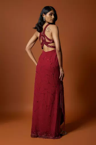 Red embroidered asymmetrical gown