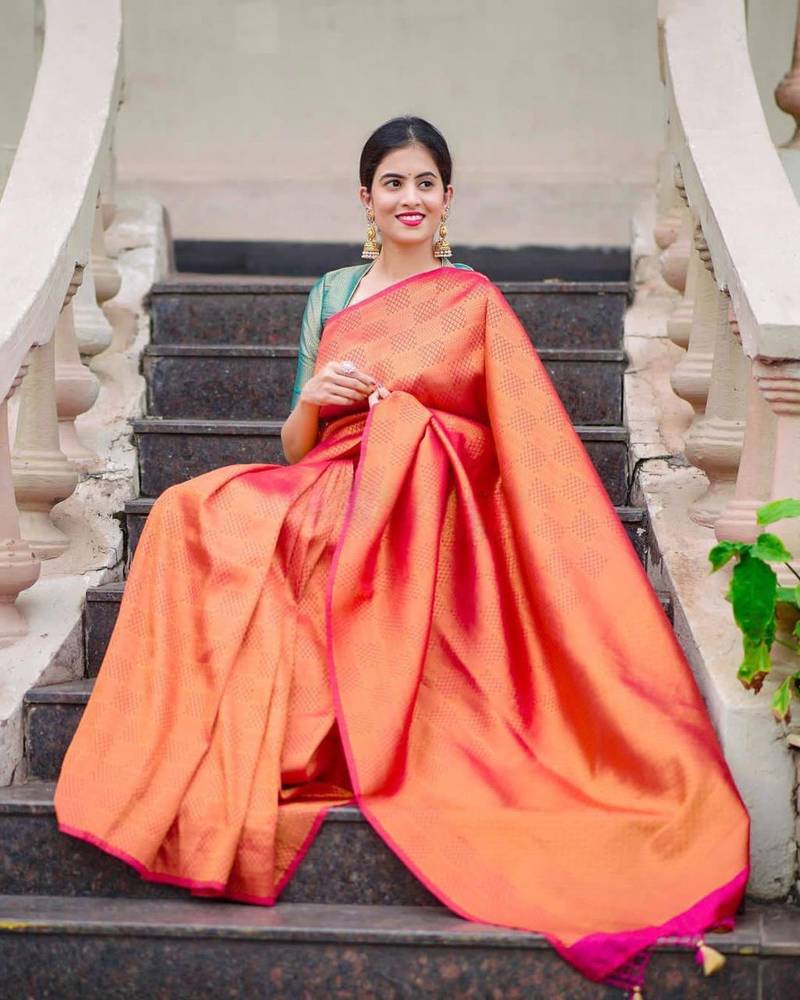 Pink woven design lichi silk saree with blouse