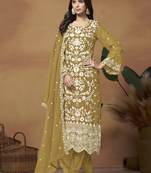 Beautiful green colour pakistani style suit on organza fabric for trendy party looks