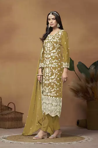Beautiful green colour pakistani style suit on organza fabric for trendy party looks