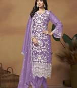 Beautiful lavender colour pakistani style suit on organza fabric for trendy party looks