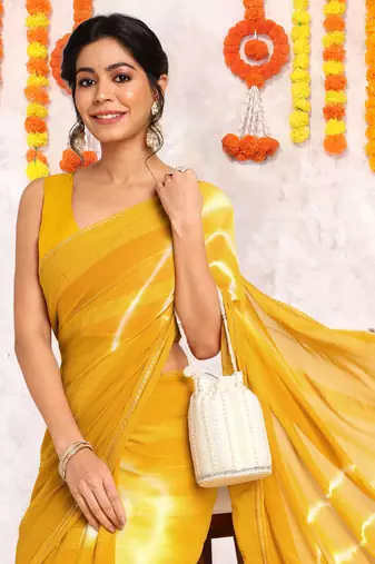 Mustard chiffon shibori print gotta pati lace border saree with unstitched blouse piece