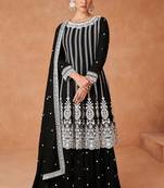 Black embroidered work silk bland fabric kurta palazzo with dupatta.