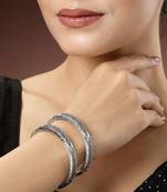 Women set of 2 silver-toned german silver peacock design oxidised kada bangle