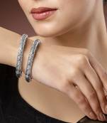 Women set of 2 silver-toned german silver floral oxidised kada bangle