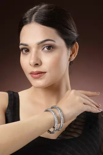 Women set of 2 silver-toned german silver floral oxidised kada bangle