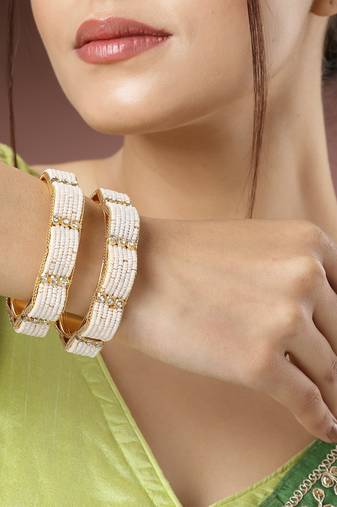 Women set of 2 gold-plated pearl handcrafted traditional bangles