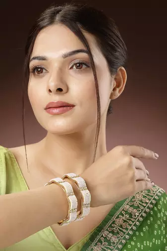 Women set of 2 gold-plated pearl handcrafted traditional bangles