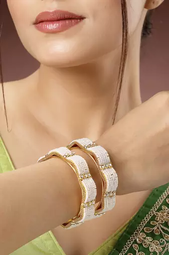 Women set of 2 gold-plated pearl handcrafted traditional bangles