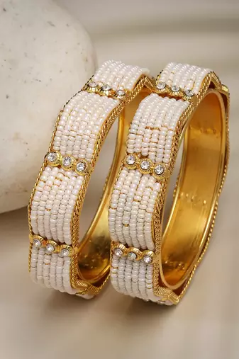 Women set of 2 gold-plated pearl handcrafted traditional bangles
