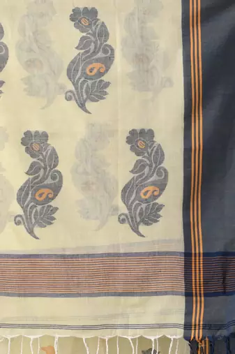 Ecru cotton handspun soft saree with leaf motifs
