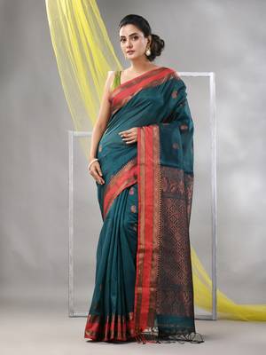 Emerald green silk matka soft saree with paisley motifs 1