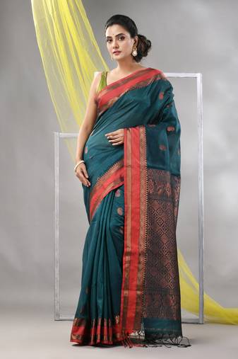 Emerald green silk matka soft saree with paisley motifs