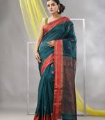 Emerald green silk matka soft saree with paisley motifs