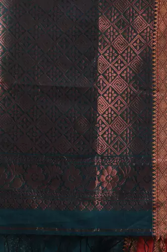 Emerald green silk matka soft saree with paisley motifs