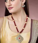 Women red kundan-studded & beaded handcrafted jewellery set