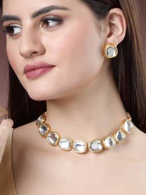 Women gold  handcrafted kundan-studded jewellery set 1