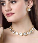 Women gold  handcrafted kundan-studded jewellery set