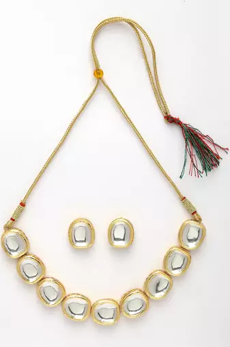 Women gold  handcrafted kundan-studded jewellery set