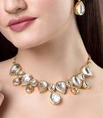 Women gold kundan-studded handcrafted jewellery set