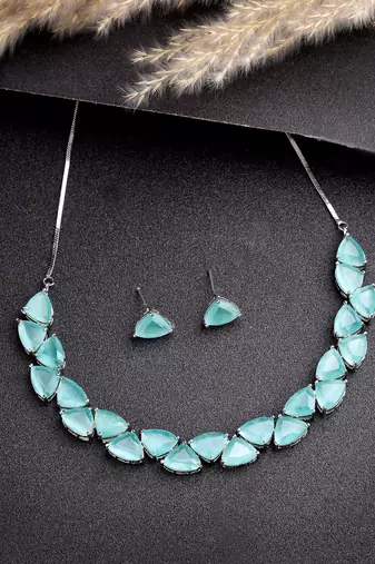 Women green artificial stones studded handcrafted jewellery set