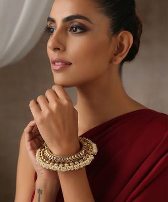 Gold tone pearl temple work kada 1