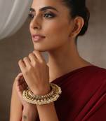 Gold tone pearl temple work kada