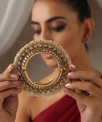 Gold tone pearl temple work kada 2