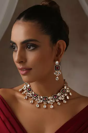 Red gold tone moissanite polki necklace set with maang tikka
