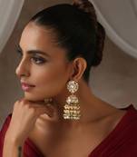 Gold tone polki and pearls jhumka earrings