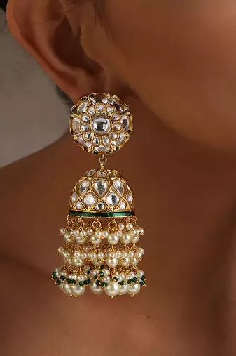 Gold tone polki and pearls jhumka earrings