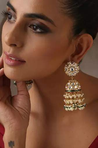 Gold tone polki and pearls jhumka earrings