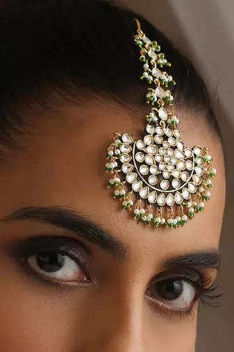 Gold tone polki and pearls maang tikka