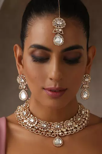 Rose gold tone moissanite polki set with maang tikka