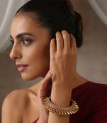 Red gold tone temple kada