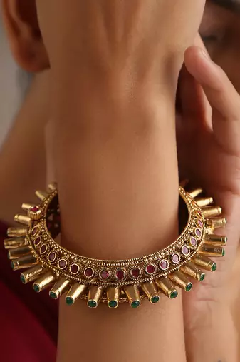 Red gold tone temple kada