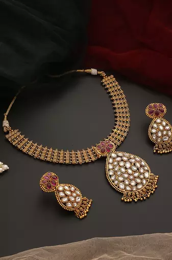 Red gold tone kundan temple necklace set