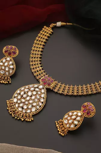 Red gold tone kundan temple necklace set