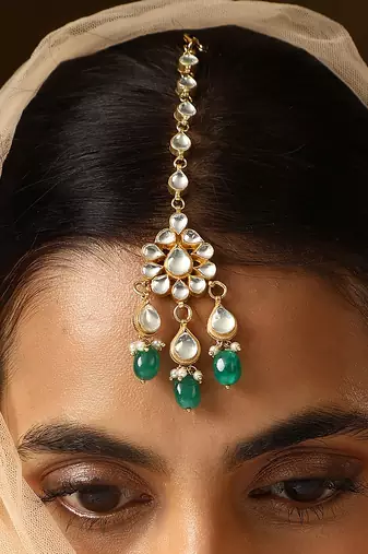 Green gold tone kundan maang tikka
