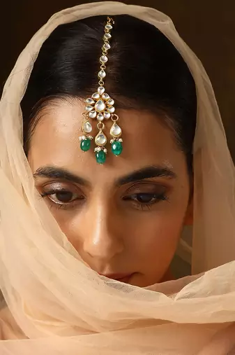 Green gold tone kundan maang tikka